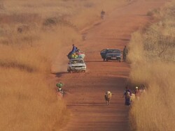 MS Travelling on road with cars, people,luggages and  animals walking in desert / Fouta-Djalon, Djibouti Stock Footage