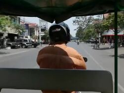 MS POV TukTukpassing through street / Siem Reap, Siem Reap, Cambodia Stock Footage