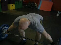 Medium close-up. Dustin performs a snatch. Stock Footage