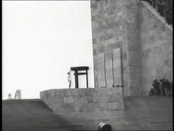 An athlete lights the torch at the Olympics in Berlin. News Clip