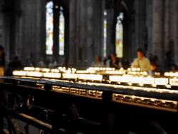 Candles burning at Cologne cathedral Stock Footage