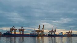 Time Lapse : Morning view of cargo port reflecting with the river Stock Footage