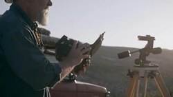 Middle-Aged Caucasian Male Outdoor Photographer Adjusting Camera Stock Footage