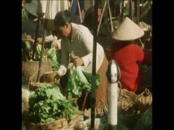 SYND 9 2 71 EVERYDAY LIFE IN VENTIANE CONTINUES DESPITE INVASION OF THE SOUTH News Clip