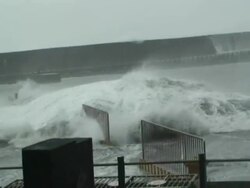 Storm surge overflows into harbour; Typhoon Jangmi, Taiwan, 28th September 2008 (With Audio) Stock Footage