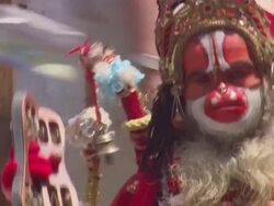 MS  Man dressed up inextravigent costume with monkey mask AUDIO / Kathmandu, Central Region, Nepal Stock Footage