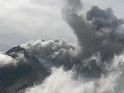 Merapi volcano erupts ash and pyroclastic flows; Central Java, Indonesia. 29 October 2010 Stock Footage