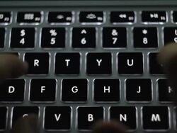 Hand typing a laptop Stock Footage