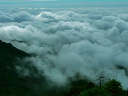 WS POV T/L View of Cloud sea and sunlight at in Jungbong (one of the mountaintop) in Chirisan National Park at sunrise / Sancheong, Gyeongsangnam-do,South Korea  Stock Footage