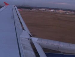 HD, NTSC: Landing of the airplane at the dusk (video) Stock Footage