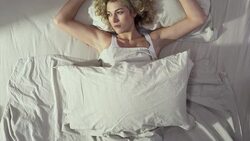 Sad Woman Lying In Bed Stock Footage