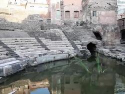 Catania, view of the orchestra and the cavea of the Roman theater, 1st century A.D. on an early Greek theater Stock Footage