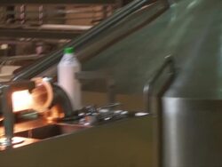 CU ZO Shot of water tap pouring into brew kettle / Wau, Western Bahr el Ghazal, Sudan  Stock Footage