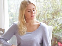 Portait of attractive female in living room Stock Footage