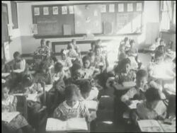 Black students attend school. News Clip
