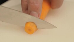 Cutting carrots Stock Footage