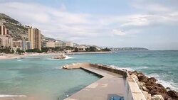 Panning shot Monaco Beach Monte Carlo french riviera Stock Footage