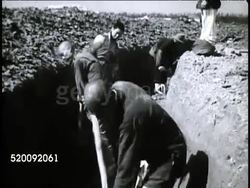 1948: REPUBLIC OF CHINA: VS Chinese male workers digging drainage ditch. AGRICULTURE: ISLAND FARMERS: WS Small pump hut building w/ water flowing, VS Men inside hut, water flowing for irrigation, HA WS River w/ distant mountains in hazy BG. Instructional Video
