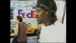 Pavement seller selling 9/11 posters News Clip