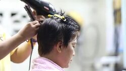A woman in a hairdressing salon Stock Footage