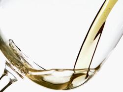  CU SLO MO Beer being poured into glass / vieux pont en auge, Normandy Stock Footage