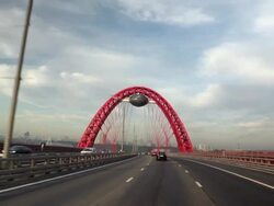 Moscow red arch suspension bridge Stock Footage
