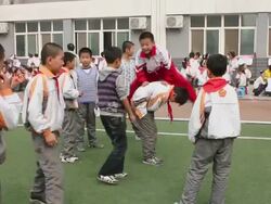 MS School students playing on playground of school/xian,shaanxi,China Stock Footage