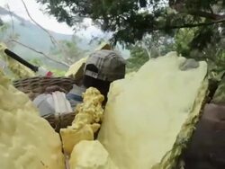 MS POV Miners carrying solid sulfur from the Ijen volcano / Ijen, Java, Indonesia Stock Footage