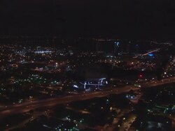 AIR TO AIR WS Helicopter flying over city at night/ Miami, Florida Stock Footage