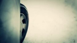 HD: Car Wheel Sliding on Snowy Road Stock Footage