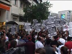 WRAP Immigrants gather to protest alleged defacement of Quran extract News Clip