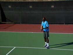 SLO MO, WS, HA, Man playing tennis, Santa Barbara, California, USA Stock Footage