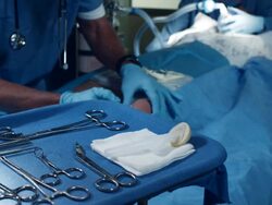 CU Surgeon making incision on patient in operating room / Edmonds, Washington, USA Stock Footage