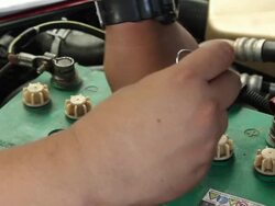 Man checking battery car Stock Footage