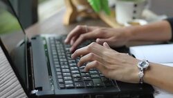 Women's hands typing on keyboard  computer Stock Footage