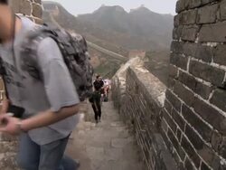 Tourists on of the Great Wall of China, who have been walking the length of the wall in its entirety. Stock Footage