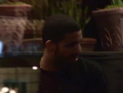 Drake meets James Stunt while arriving for dinner at Madeo in West Hollywood - Celebrity Sightings in Los Angeles Stock Footage