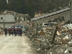 Destruction in Rikuzentakata, Iwate Prefecture, Japan on 2nd April 2011; 3 weeks after the tsunami following the Tohuku earthquake of March 2011. Stock Footage