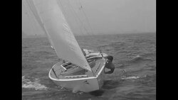 Scenes on Lake Michigan of small yachts passing each other during Chicago Star boat race News Clip