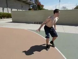 POV MS of basketball court and black and white players dribbling the ball. Stock Footage