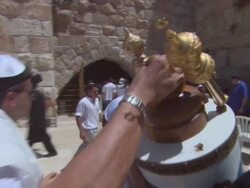 MS POV Men helping to man carrying Torah at Wailing Wall / Jerusalem, Israel Stock Footage