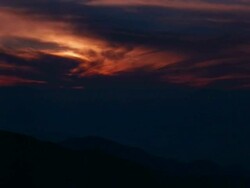T/L sun setting over mountains, Kamikochi, Japan Stock Footage