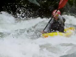 MS PAN SLO MO Man whitewater kayaking on a jungle river / Tena, Napo, Ecuador Stock Footage
