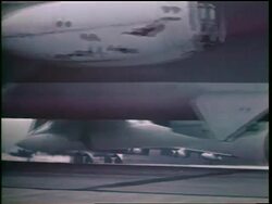 1960s close up bottom of B-52 bomber taxiing on runway / Cold War / documentary Stock Footage
