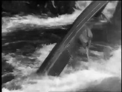 B/W 1961 overturned kayak in rapids standing on end in slalom competition / Czechoslovakia Stock Footage