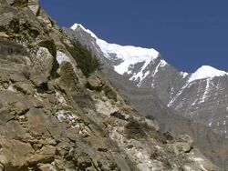 WS T/L View of clouds passing over dark mountain peaksat evening / High Himalayas,UpperDolpo, Nepal  Stock Footage