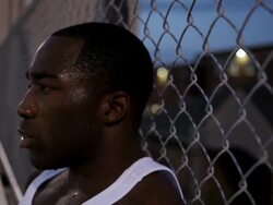 CU Young man resting and catching his breath after working out and exercising on  set of bleachers at dusk / Minneapolis, Minnesota, United States Stock Footage
