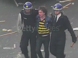 Police Leading Away Anti-Poll Tax Protester News Clip