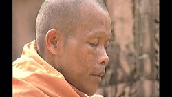 Buddhist monks praying at Angkor Wat News Clip