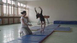 4K: Girl practicing gymnastics Stock Footage